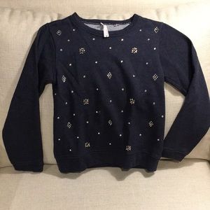 Rhinestone embellished sweatshirt.